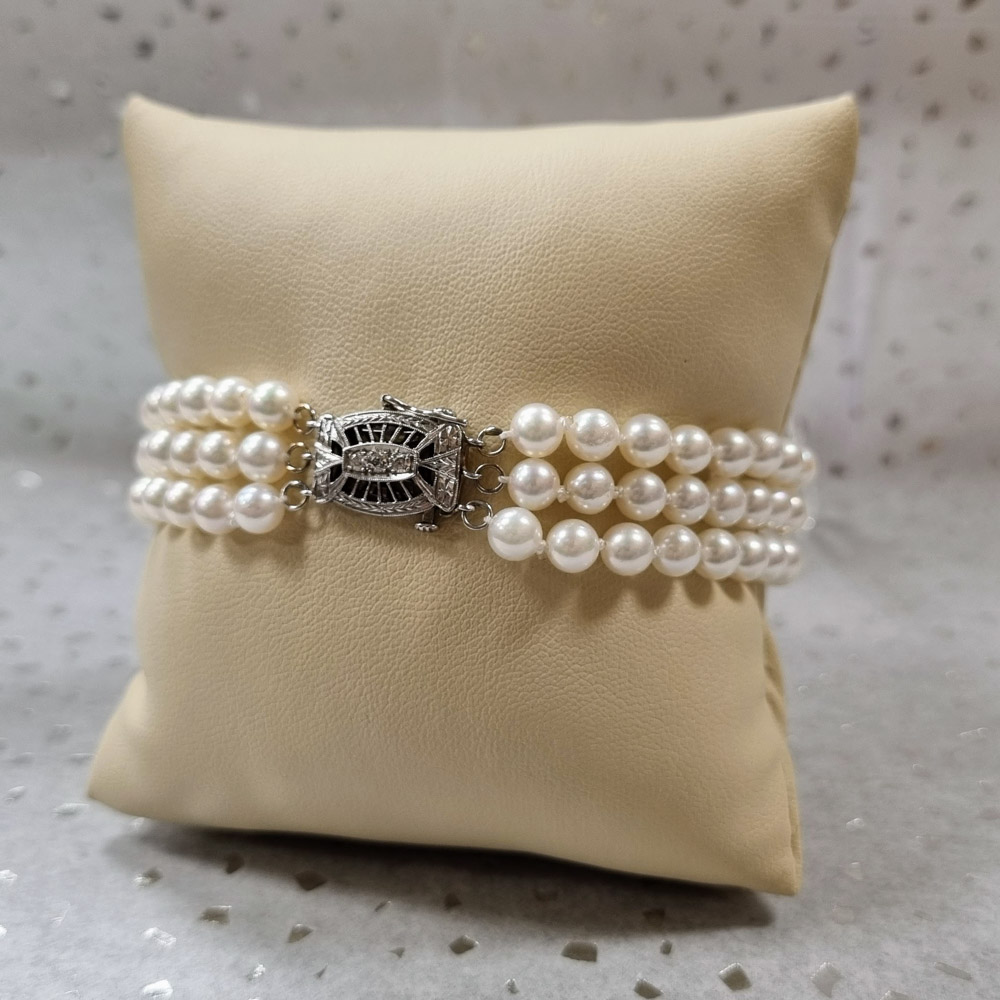 Akoya pearl three strand bracelet with platinum clasp 0.15ctw diamonds